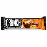 Warrior Crunch chokolade jordnøddesmørbæger på hvid baggrund